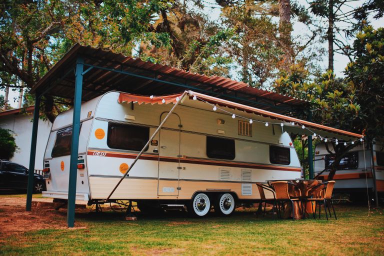 River Ranch motorhome rental campsite in a wooded outdoor setting